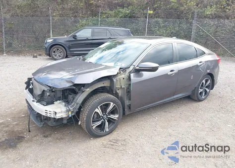 2017 Honda Civic Touring z USA, uszkodzony, nr VIN 2HGFC1F97HH654564